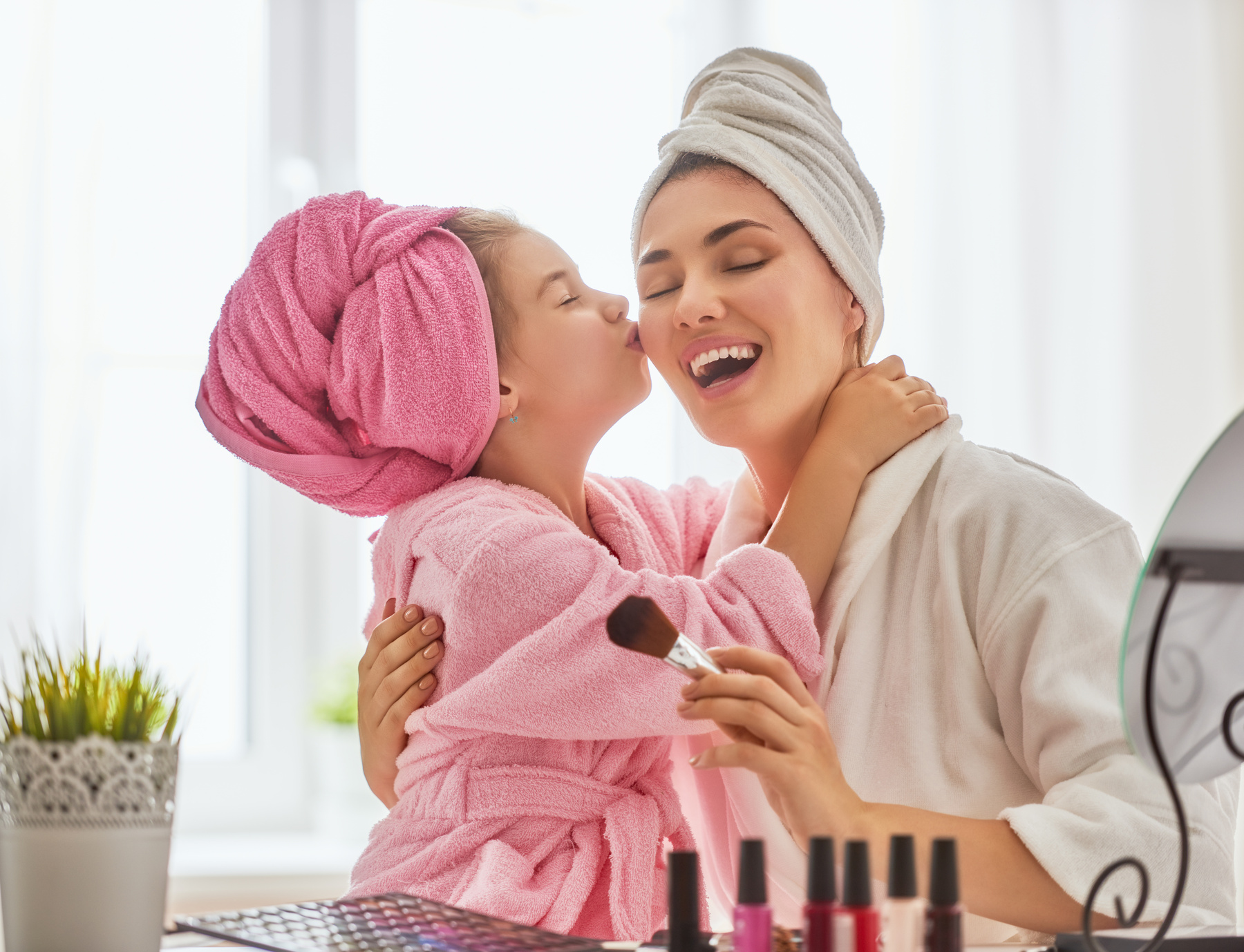 Mother and Daughter Doing Make up