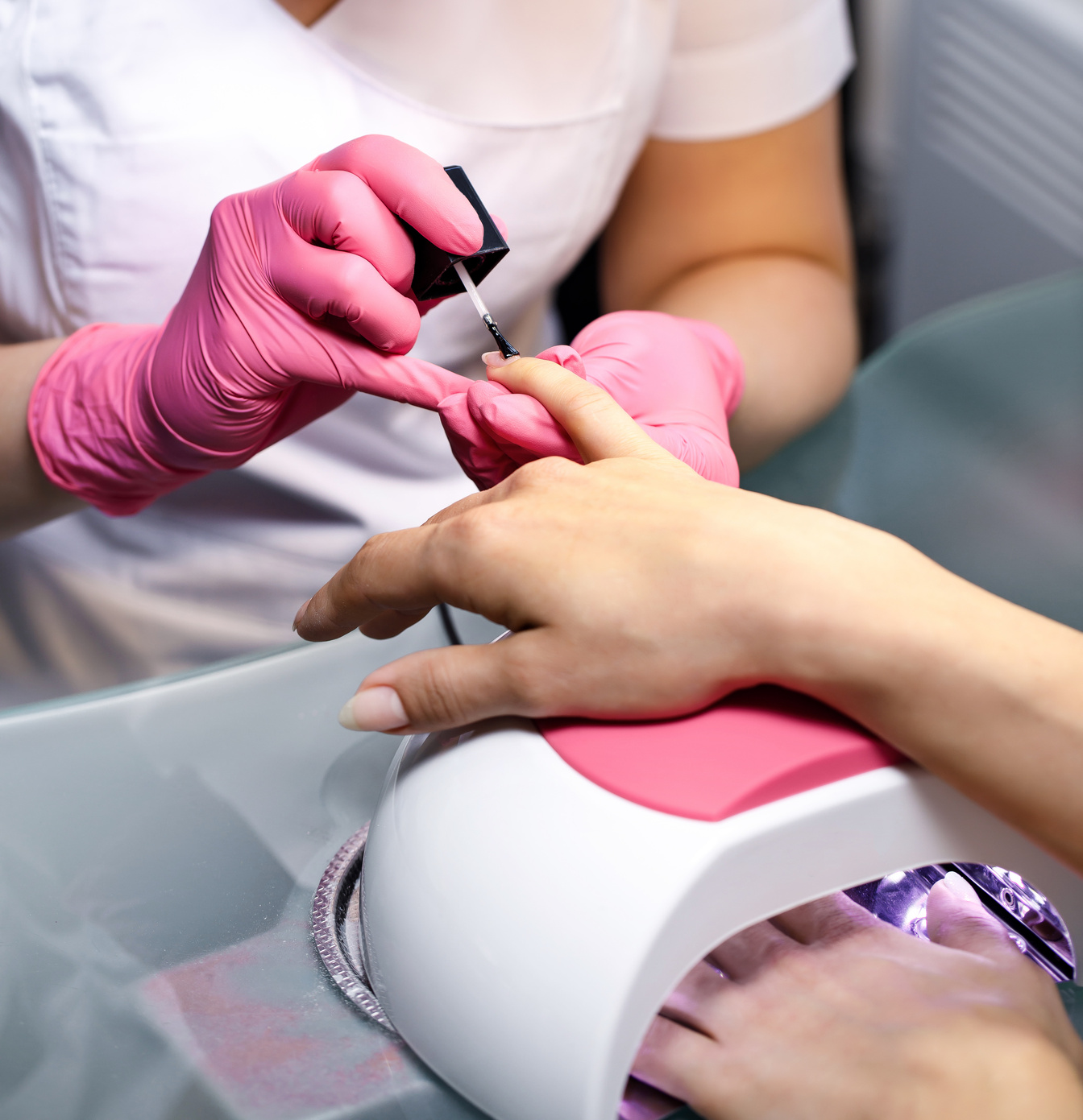 Beautician Applying Polish Nails